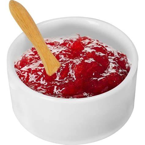 Lesena žlička z breskovo marmelado